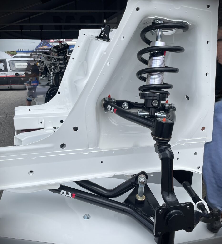 Cutaway chassis mockup of a QA1 shock tower